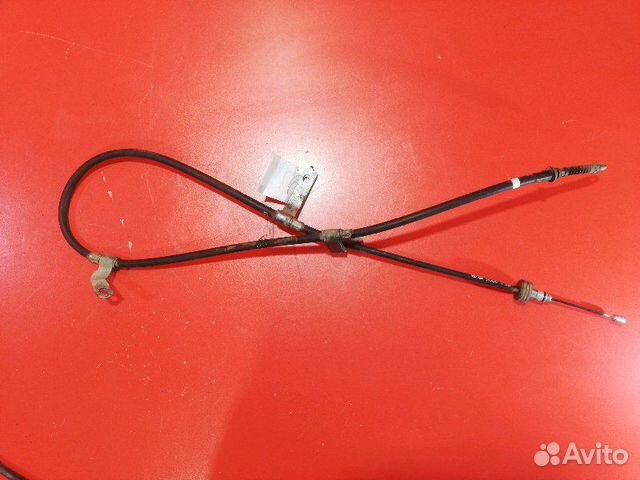 Трос стояночного тормоза левый Hyundai Solaris RB