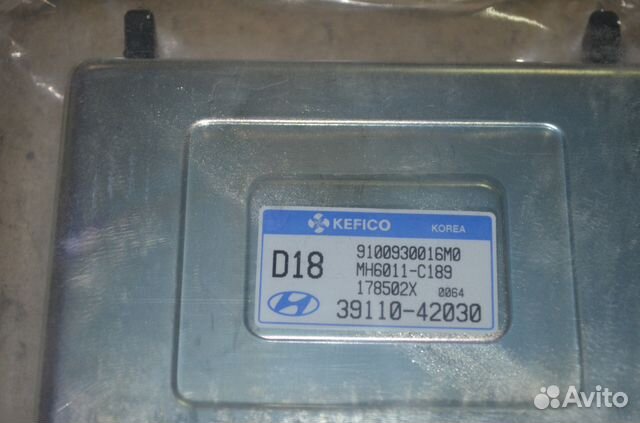 Hyundai H-1 блок управления двигателем 3911042030