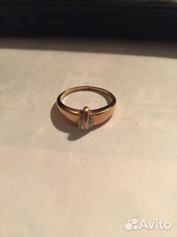 Золотое кольцо с подвижным цирконом