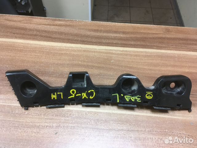 Кронштейн заднего бампера левый Mazda CX5 Кронштейн заднего бампера левый Mazda CX5