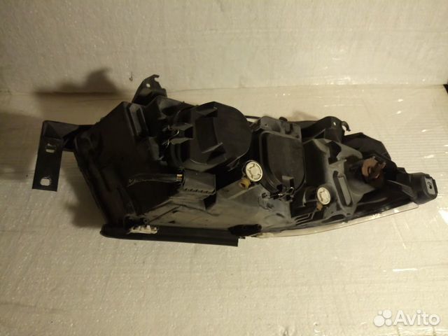 Фара левая BMW 3 e90 04-08