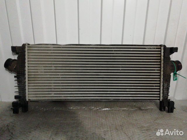 Радиатор интеркулера передний Opel Astra J 1.4