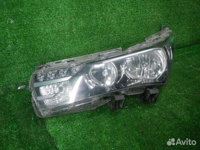 Фара левая Toyota Corolla E160 (2012-2016) галоген