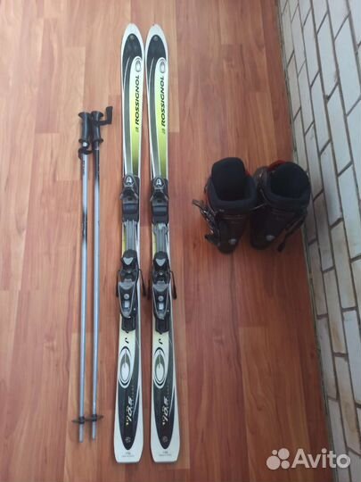 Горнолыжные ботинки и лыжи