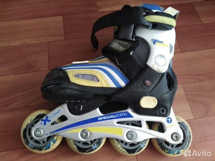 Роликовые коньки