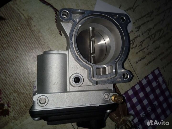 Дросельная заслонка