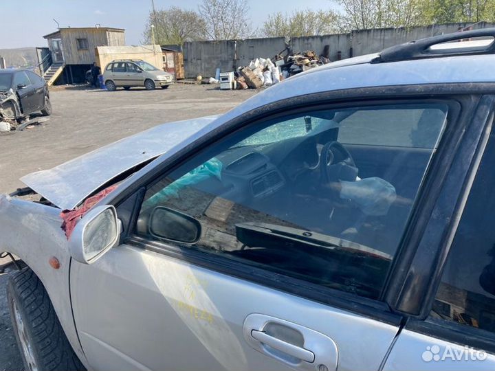 Стекло двери переднее левое Subaru Impreza GG2
