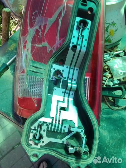 Задний левый фонарь Амарок