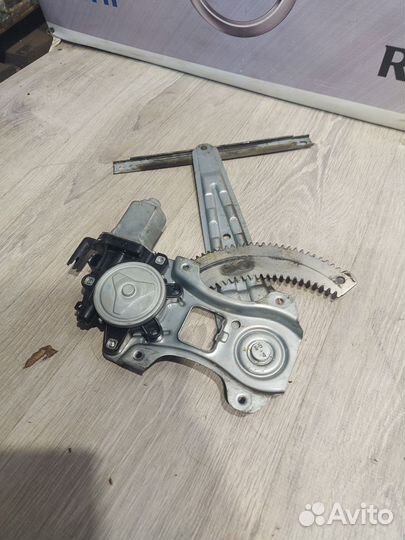 Стеклоподъемник задний Nissan tiida Лев