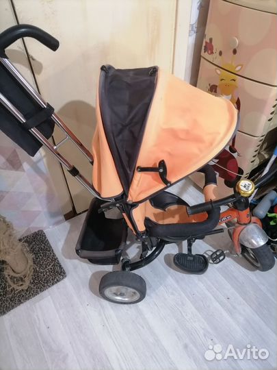 Трехколесный велосипед с ручкой