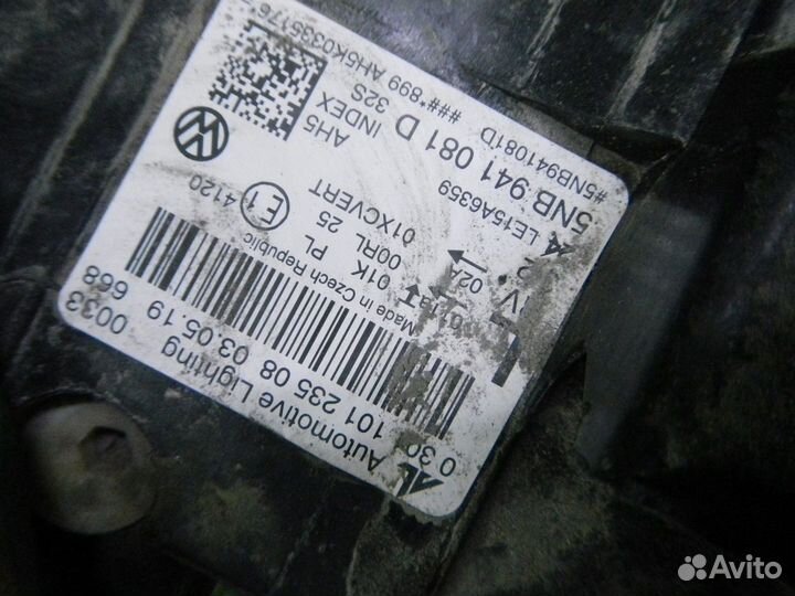 Фара левая Volkswagen Tiguan