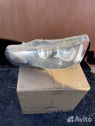 Фара левая с дефектами Mitsubishi Lancer X