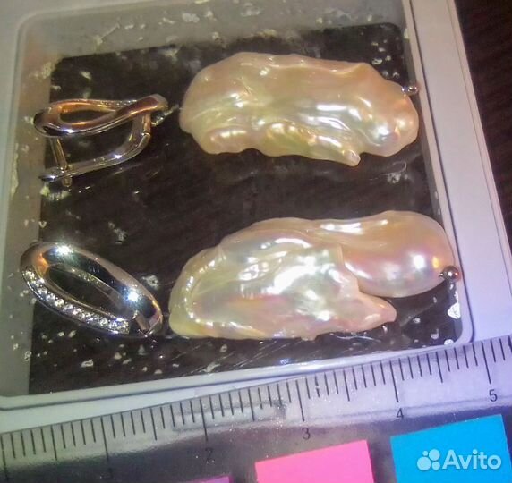 Серебряные серьги кольца бриолет
