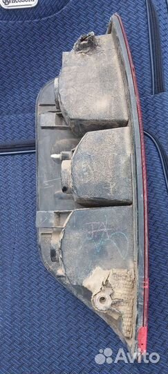 Стоп сигнал Nissan Navara левый