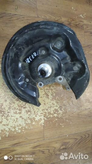 Поворотный кулак задний левый VW Passat B7