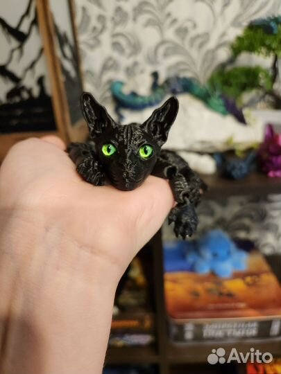 Подвижная игрушка сфинкс