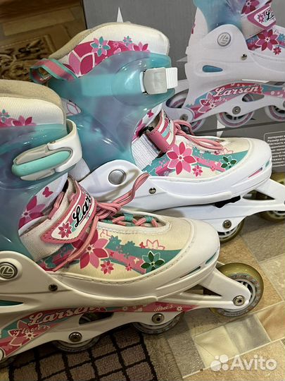 Роликовые коньки