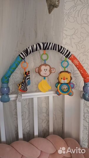 Дуга с игрушками