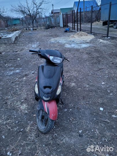 Скутер Omaks