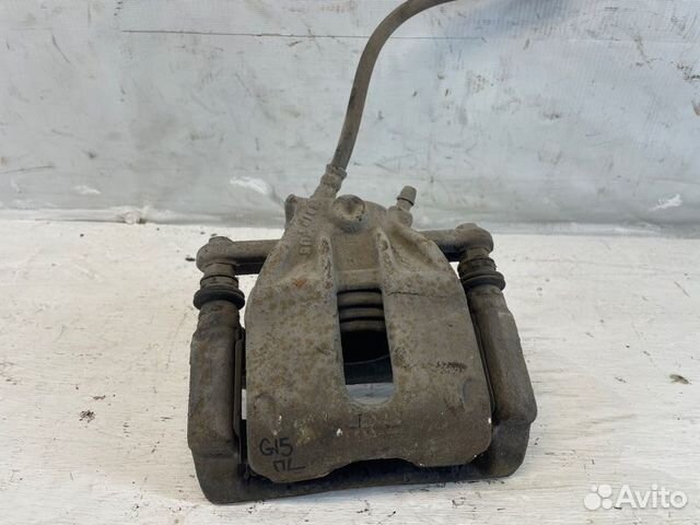 Суппорт передний левый Nissan Almera G15 K4MA490