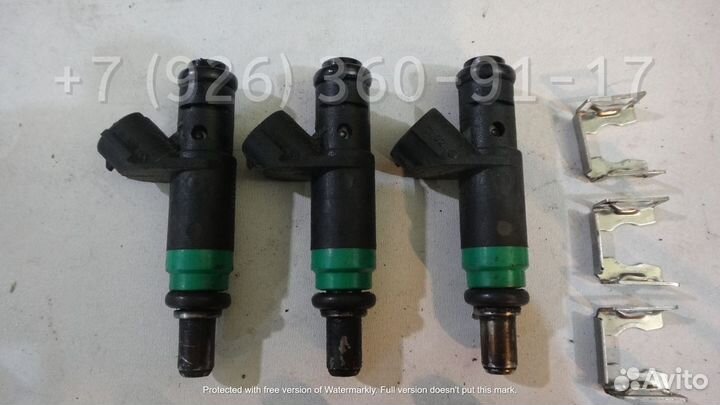 Форсунка топливная Ауди 06C133551