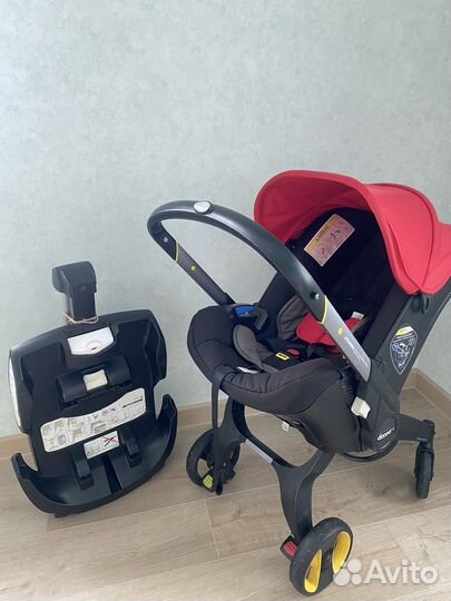Коляска автокресло doona с базой isofix
