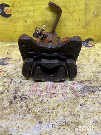 Суппорт задний правый Nissan Primera W11 SR20DE