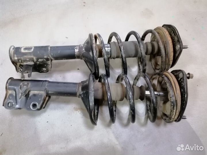 Амортизатор передний Mitsubishi Lancer (CK) 1997