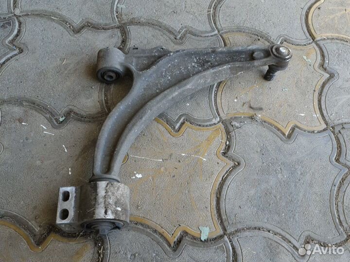 Рычаг левый Опель Астра джей