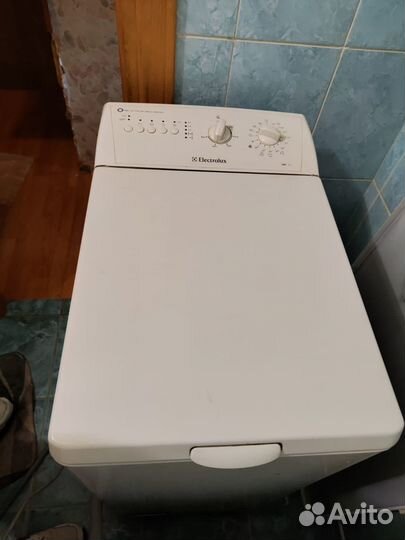 Стиральная машина с вертикальной загрузкой