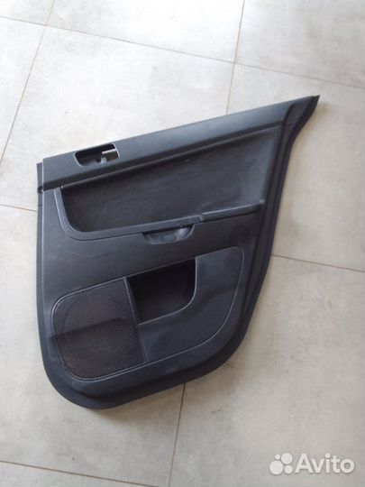 Обшивка двери задняя правая Mitsubishi Lancer 10