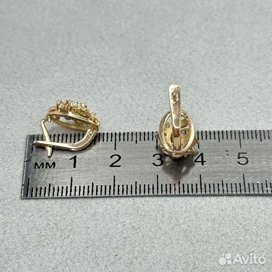 Золотые серьги с изумрудами и бриллиантами 0,31 ct