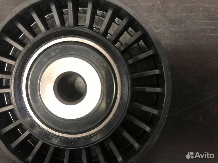 Ролик натяжителя ремня (промежуточный) SsangYong R