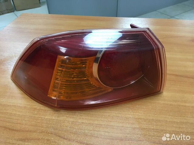 Фонарь задний левый в крыло Lancer X дорест