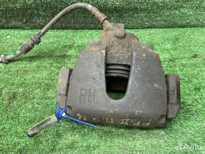 Тормозной суппорт передний правый Ford Focus 2