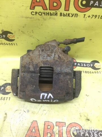 Суппорт передний левый Mazda Demio DY DY3W 2003