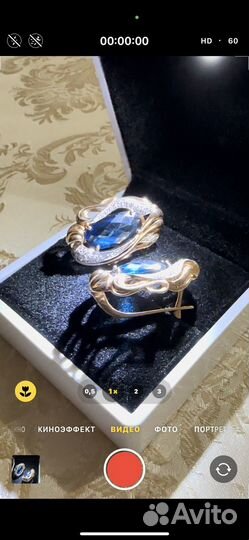 Продам золотые серьги