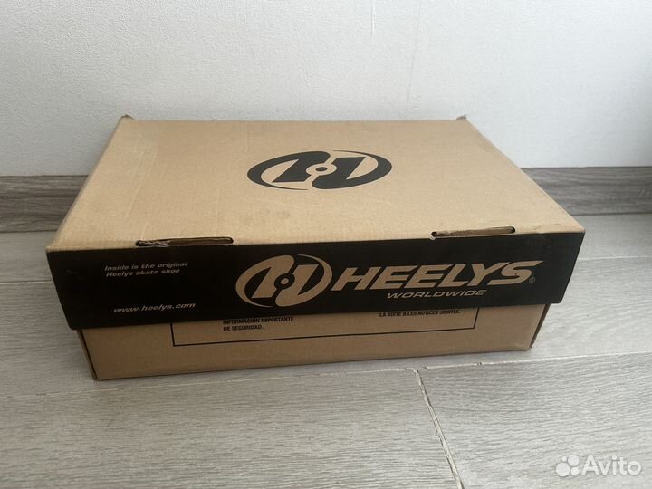 Роликовые кроссовки Heelys