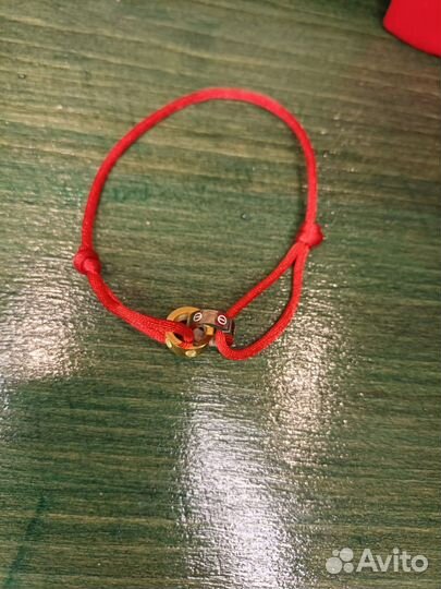 Браслет Cartier красная нить