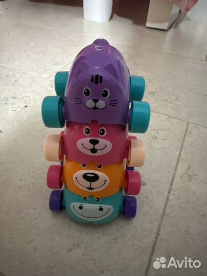 Игрушка каталка -пирамидка