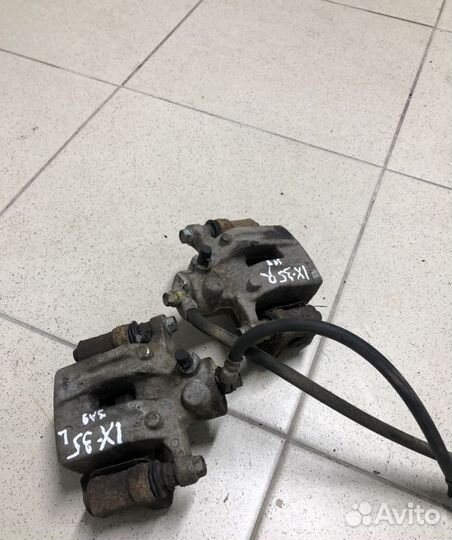 Суппорт задний Kia Sportage 3 Hyundai ix 35