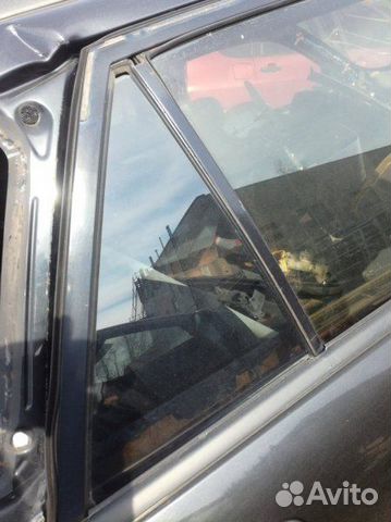 Стекло дверное заднее правое Mazda 323 BJ