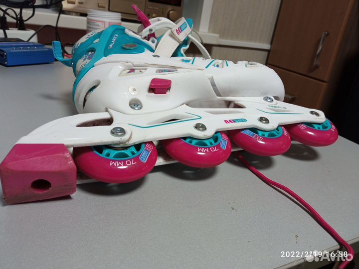 Роликовые коньки