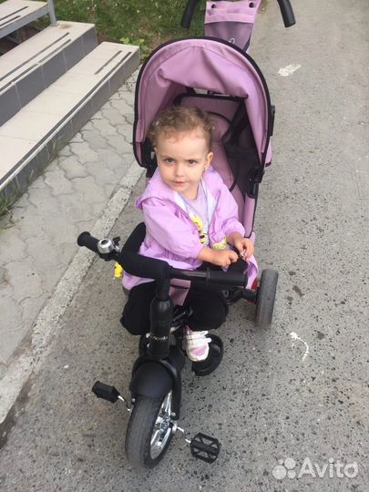 Трехколесный велосипед с ручкой