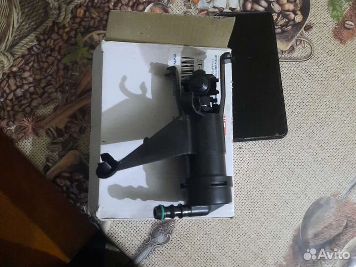 Омыватель фары Nissan Tiida