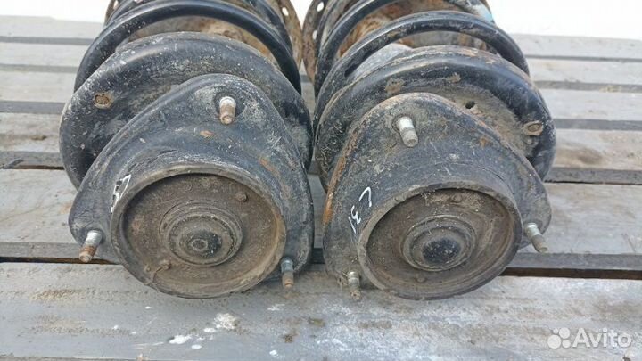 Стойка передняя Subaru Impreza GG