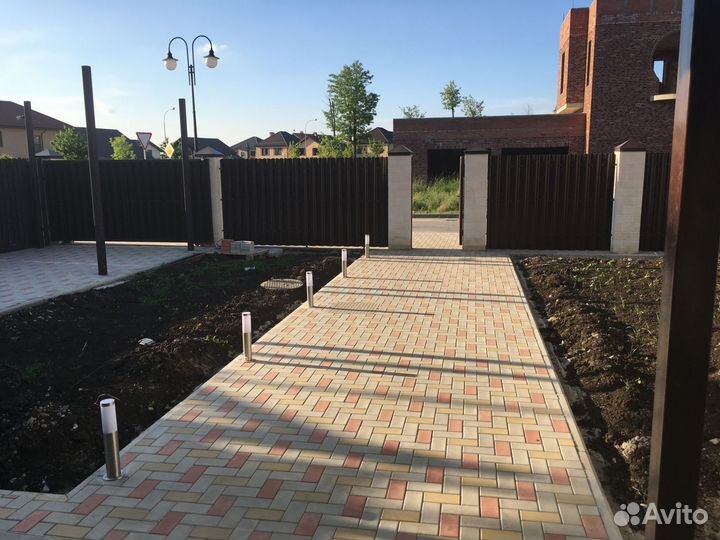 Укладка тротуарной плитки брусчатки