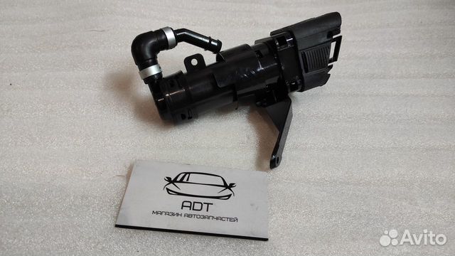 Форсунка омывателя фары левая mazda 3 BL 09-2011