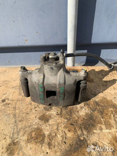 Суппорт тормозной передний левый Outlander XL