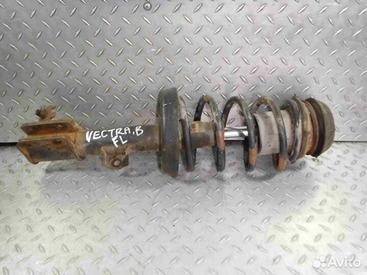 Стойка амортизатора переднего левого Opel Vectra